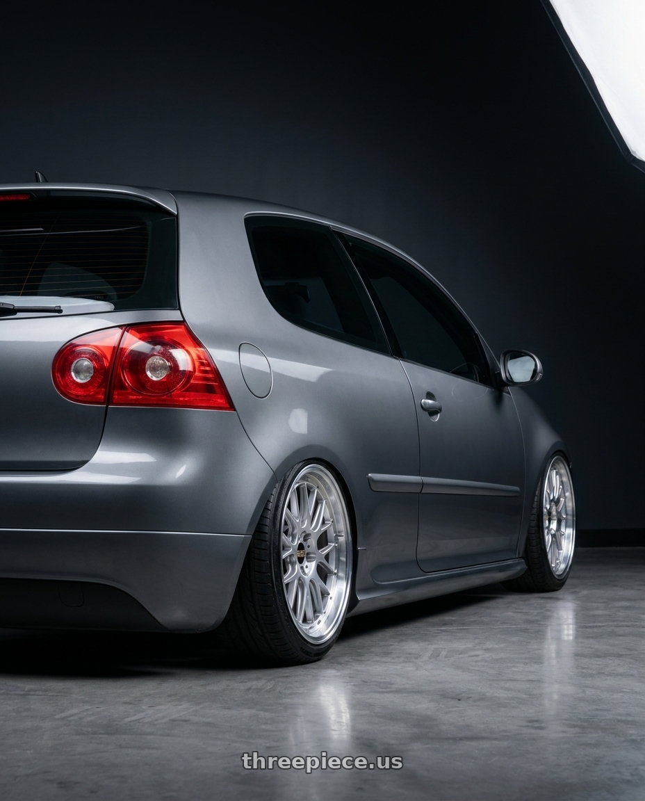 2009 VW GTI with BBS FS 5x112 19x9.5+45 Diamond Silver wheels rear three quarter view extreme stretch tires
