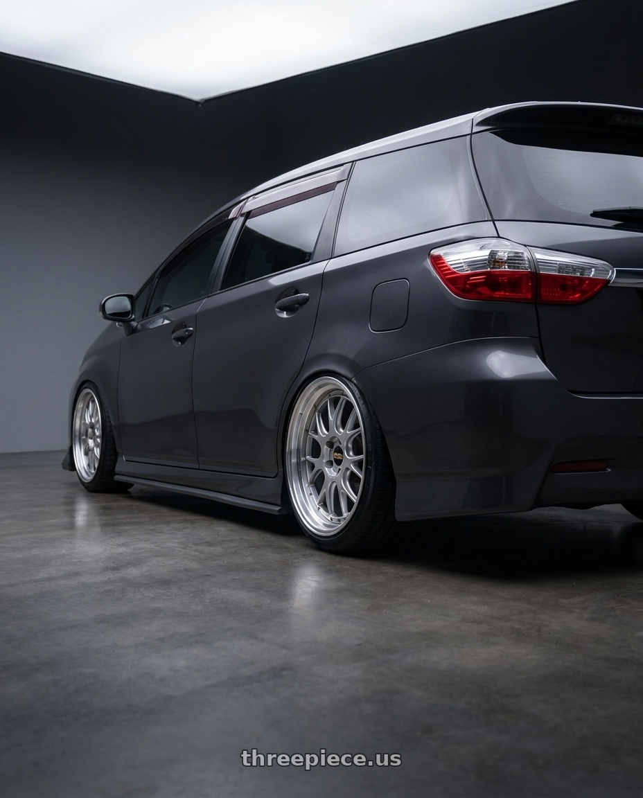 2009 toyota wish with BBS LM-R 5x114.3 19x8.5+43 Diamond Silver wheels rear three quarter view extreme stretch tires