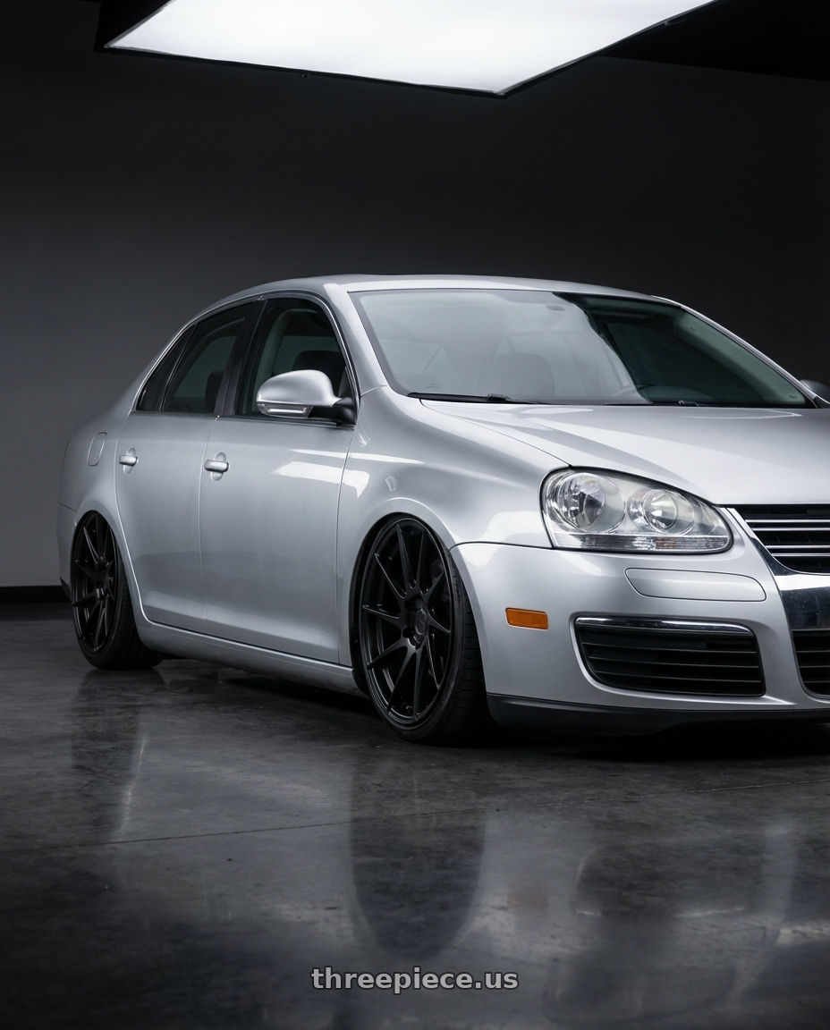 2009 Volkswagen Jetta GLI MK5 with Aodhan AH09 5x112 18x8.5 +35 Matte Black wheels
