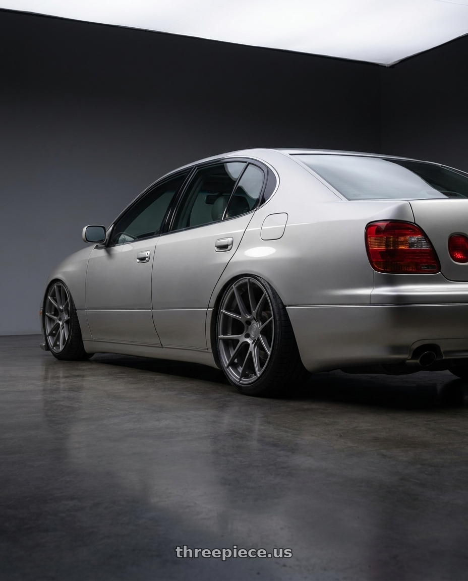 1999 Lexus Gs300 with Avant Garde Wheels M510 5X130 19x11 +52 Dolphin Grey wheels rear three quarter view slight stretch tires