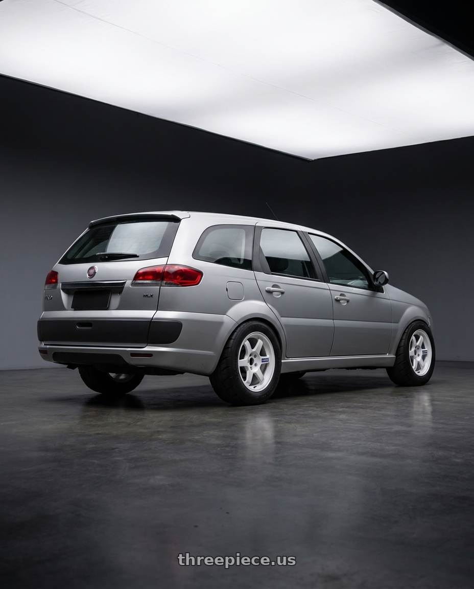 2008 Fiat Palio Weekend HLX with Volk Racing TE37 Gravel 5x114.3 15x7.0+35 White wheels rear three quarter view meaty tires