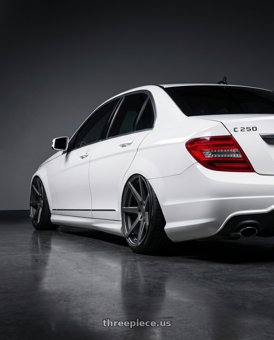 2014 Mercedes-Benz C250 with Rohana RC7 5x112 19x8.5+42 Matte Graphite wheels rear three quarter view extreme stretch tires