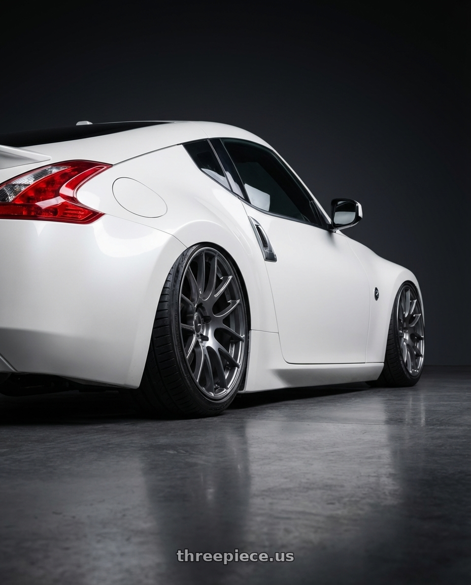 2019 Nissan 370Z with Ssr Gtv04 5x114.3 19×8.5x8.5+45  METALLIC GRAY wheels rear three quarter view slight stretch tires