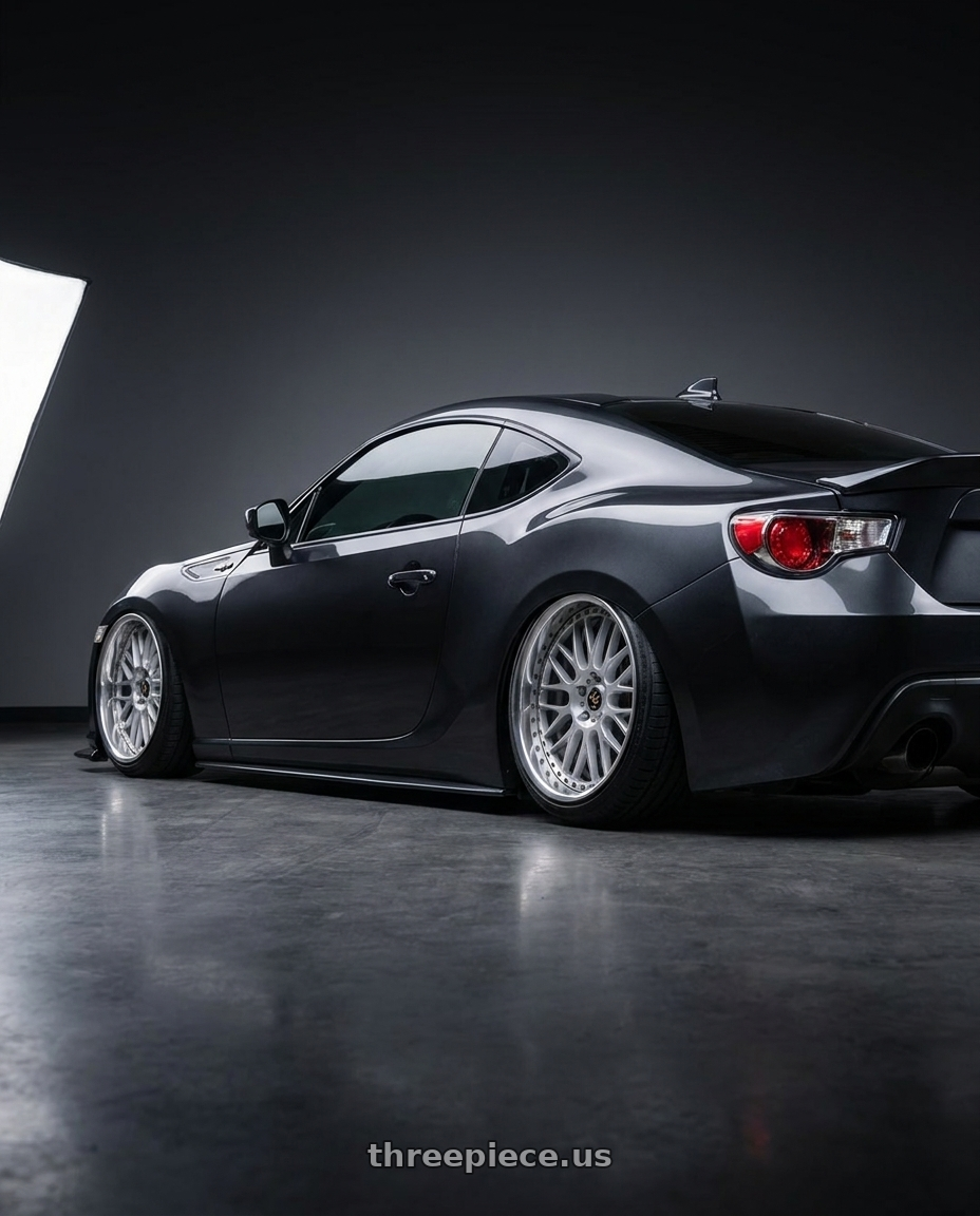2013 Scion frs with Work Vs-Xx 5x100 18x9.5-19 A Disk Light Grey Silver wheels rear three quarter view slight stretch tires