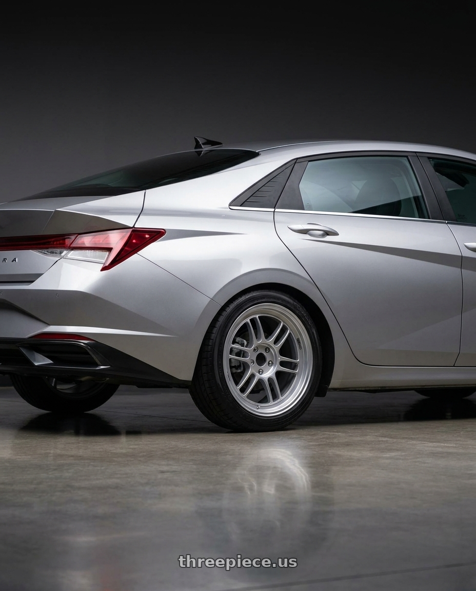 2021 Hyundai Elantra Limited with Enkei RPF1 5x114.3 17x7+45 Silver wheels rear three quarter view square tires