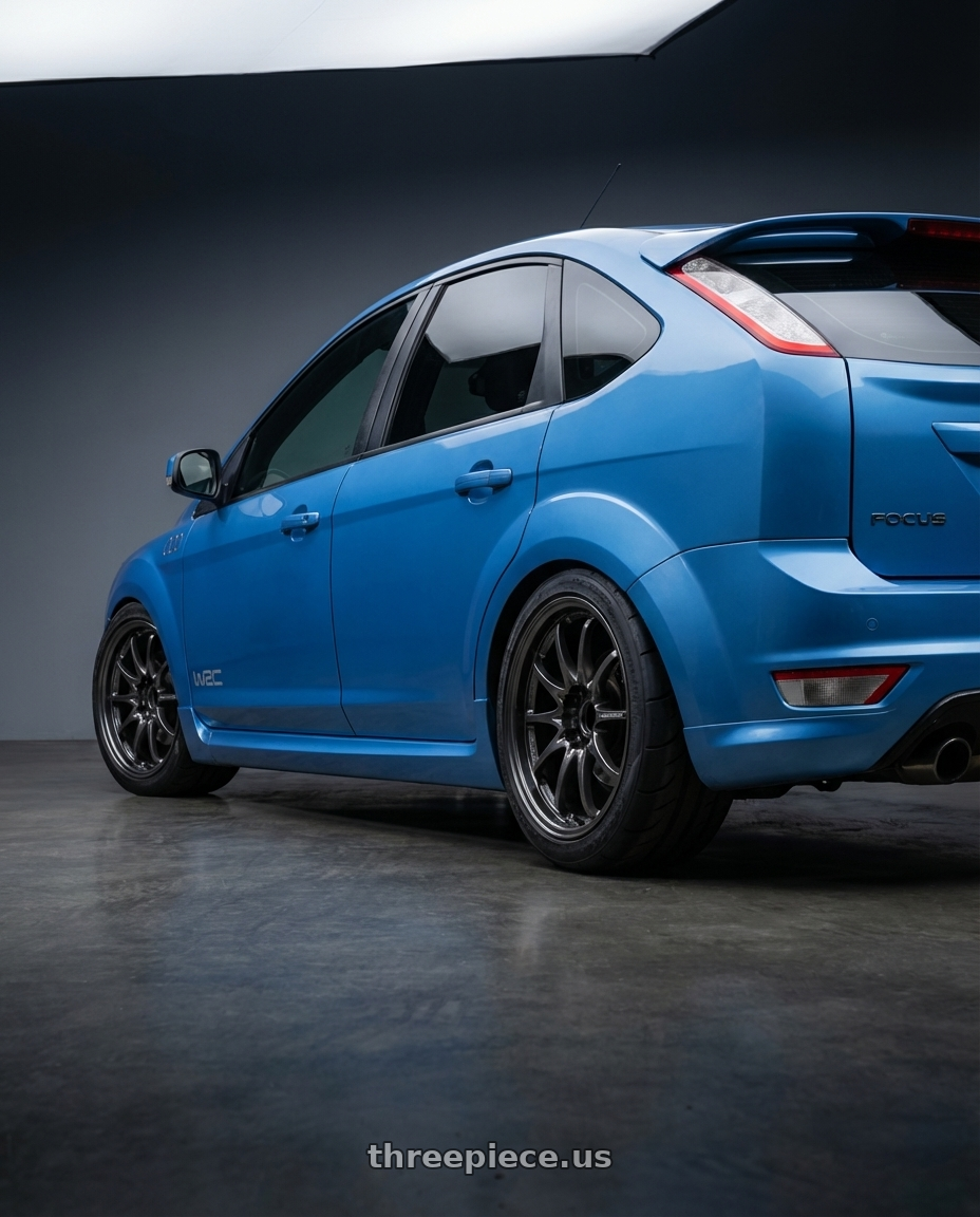 Ford focus zetec s 2008 with Volk Racing CE28N-PLUS 5x114.3 17x10 +44 DIAMOND DARK GUNMETAL wheels rear three quarter view meaty tires