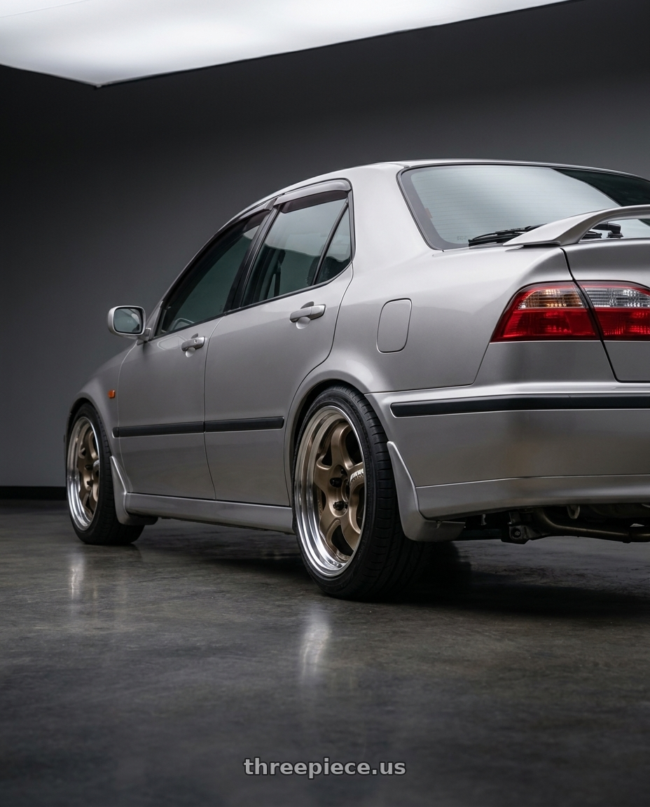 1998 honda torneo with Work Meister S1 2P 4x114.3 15x6.5+45 A Disk Titanium Gold wheels rear three quarter view square tires