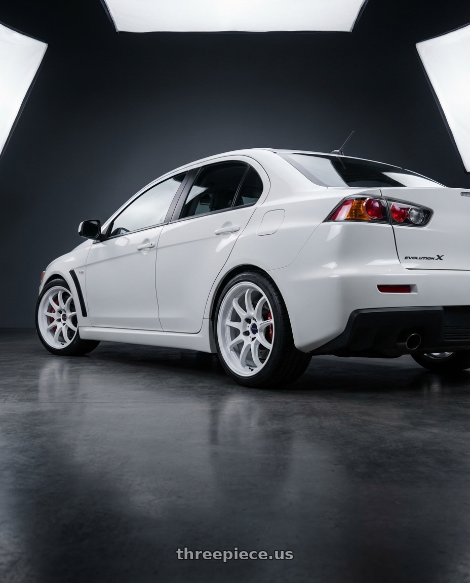 2015 evo x with Work Emotion D9r 5x100 18x9.5 +23 White wheels rear three quarter view square tires