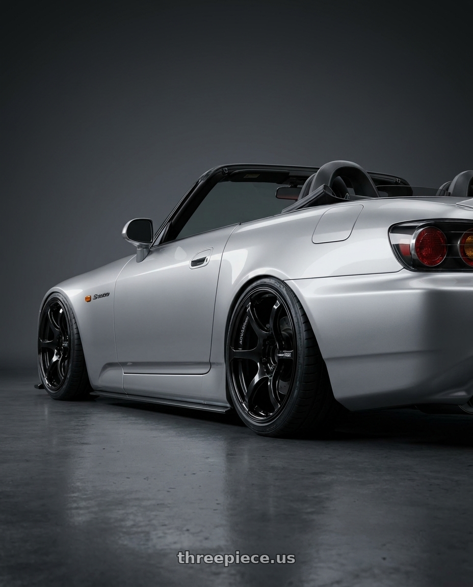 2009 Honda S2000 with Advan RGIII 5x114.3 18x9.0+45 Gloss Black wheels rear three quarter view slight stretch tires