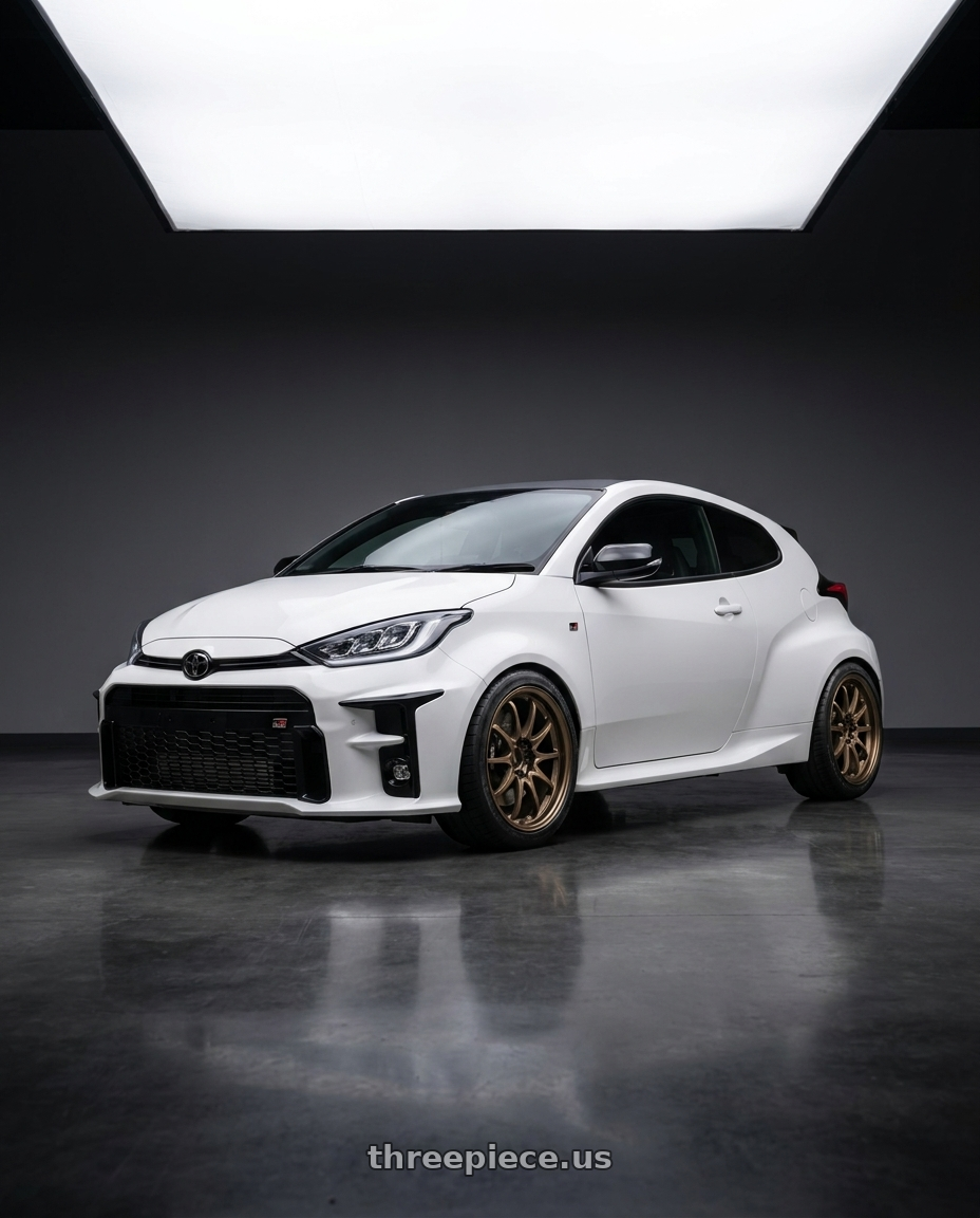 2002 Gr Yaris with Volk Racing CE28N 5x114.3 18x8.5 +30 BRONZE wheels