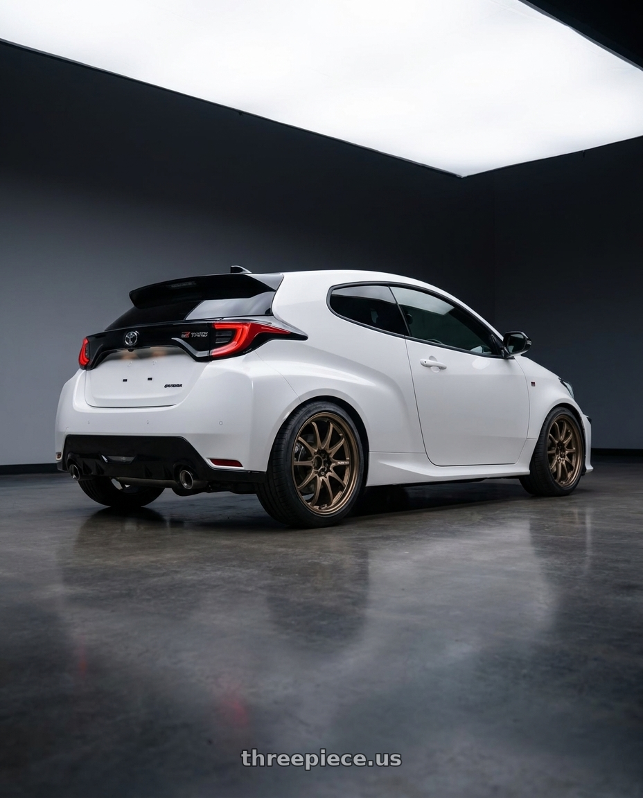 2002 Gr Yaris with Volk Racing CE28N 5x114.3 18x8.5 +30 BRONZE wheels rear three quarter view square tires