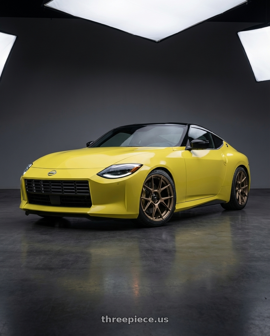 2024 Nissan Z with Konig Ampliform 5x114.3 19x9.5+35 Gloss Bronze wheels front three quarter view lowered stance