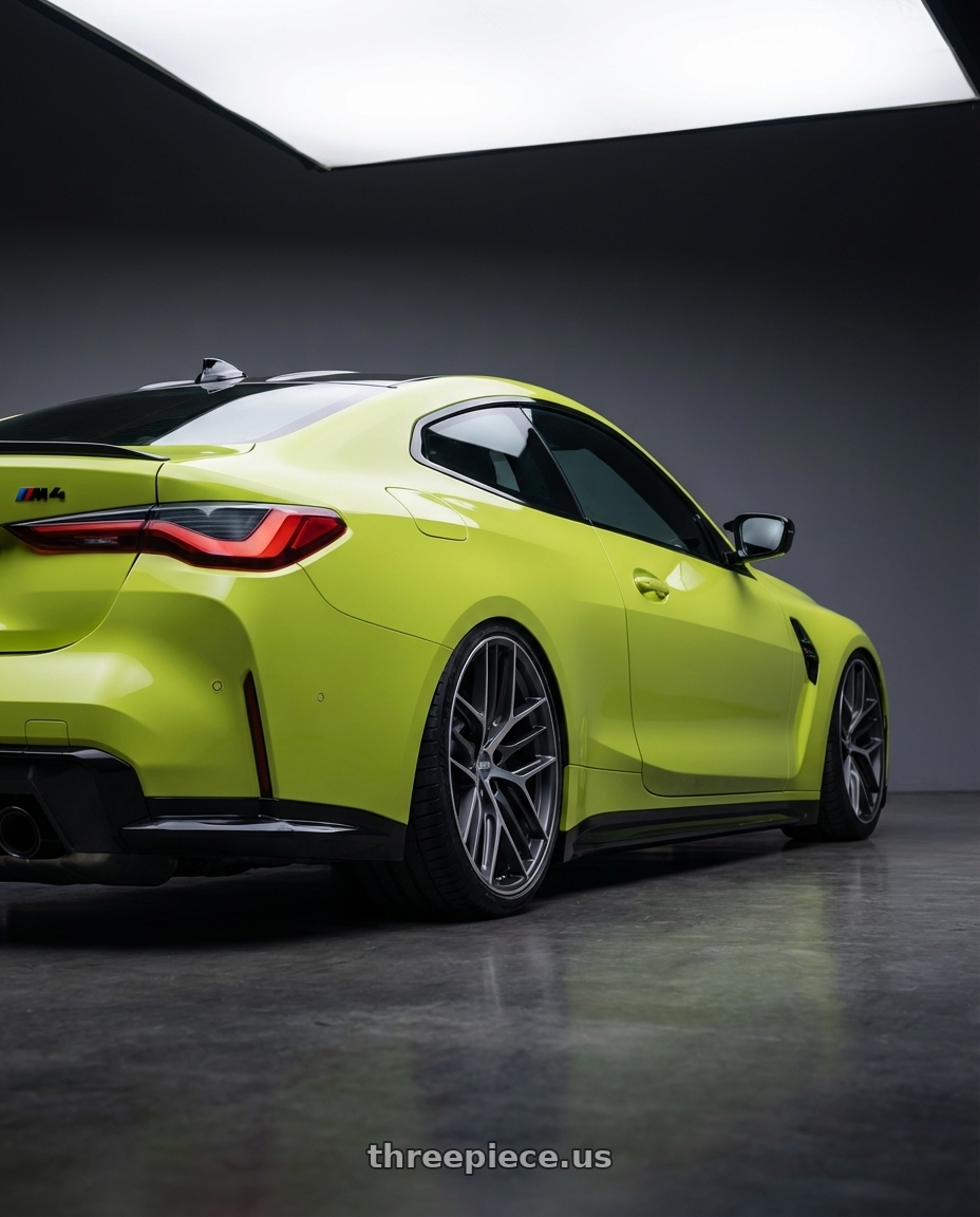 2024 BMW M4 G82 with BBS CC-R 5x112 19x9.5+42 Graphite w/ Diamond Cut Face wheels rear three quarter view slight stretch tires