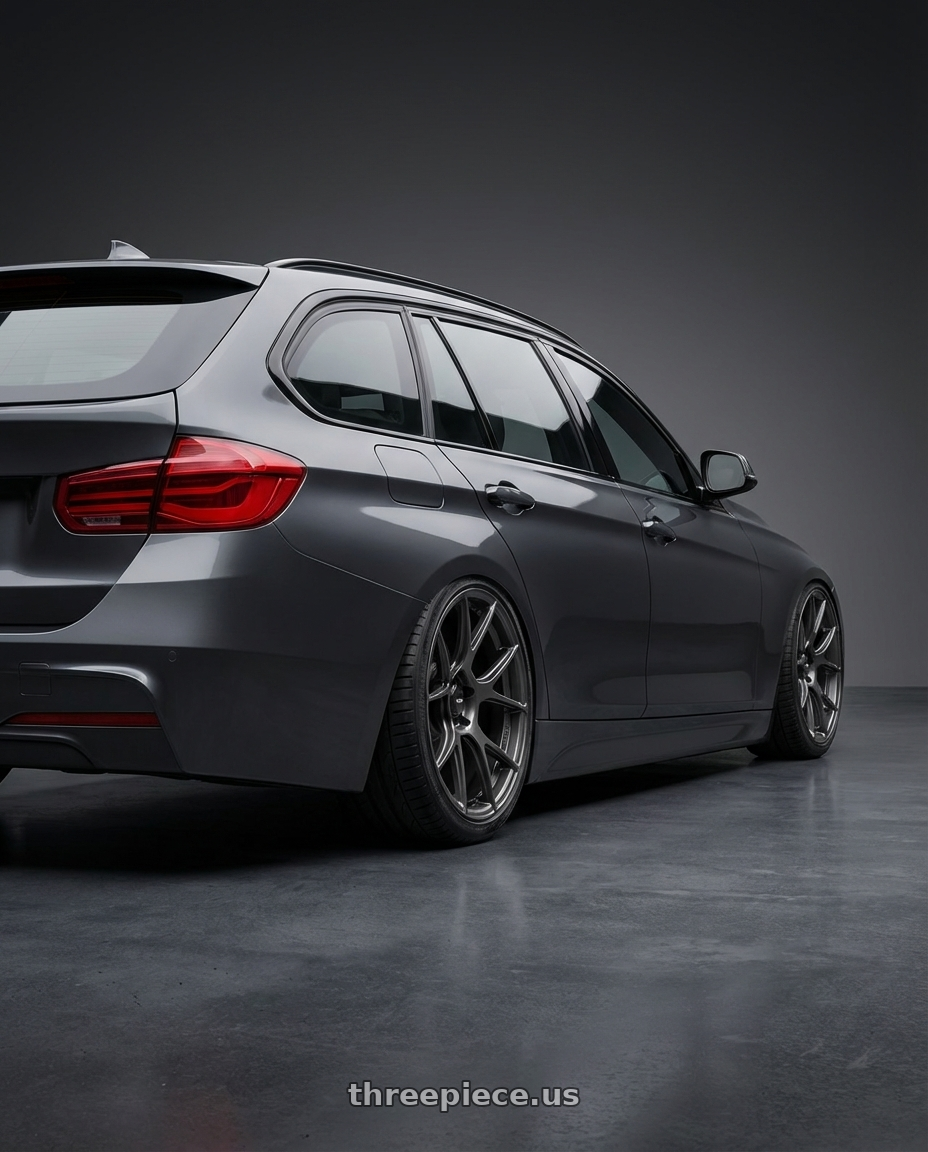 2016 BMW 3 Series F30 with Konig Ampliform 5x120 19x10+28 Dark Metallic Graphite wheels rear three quarter view slight stretch tires