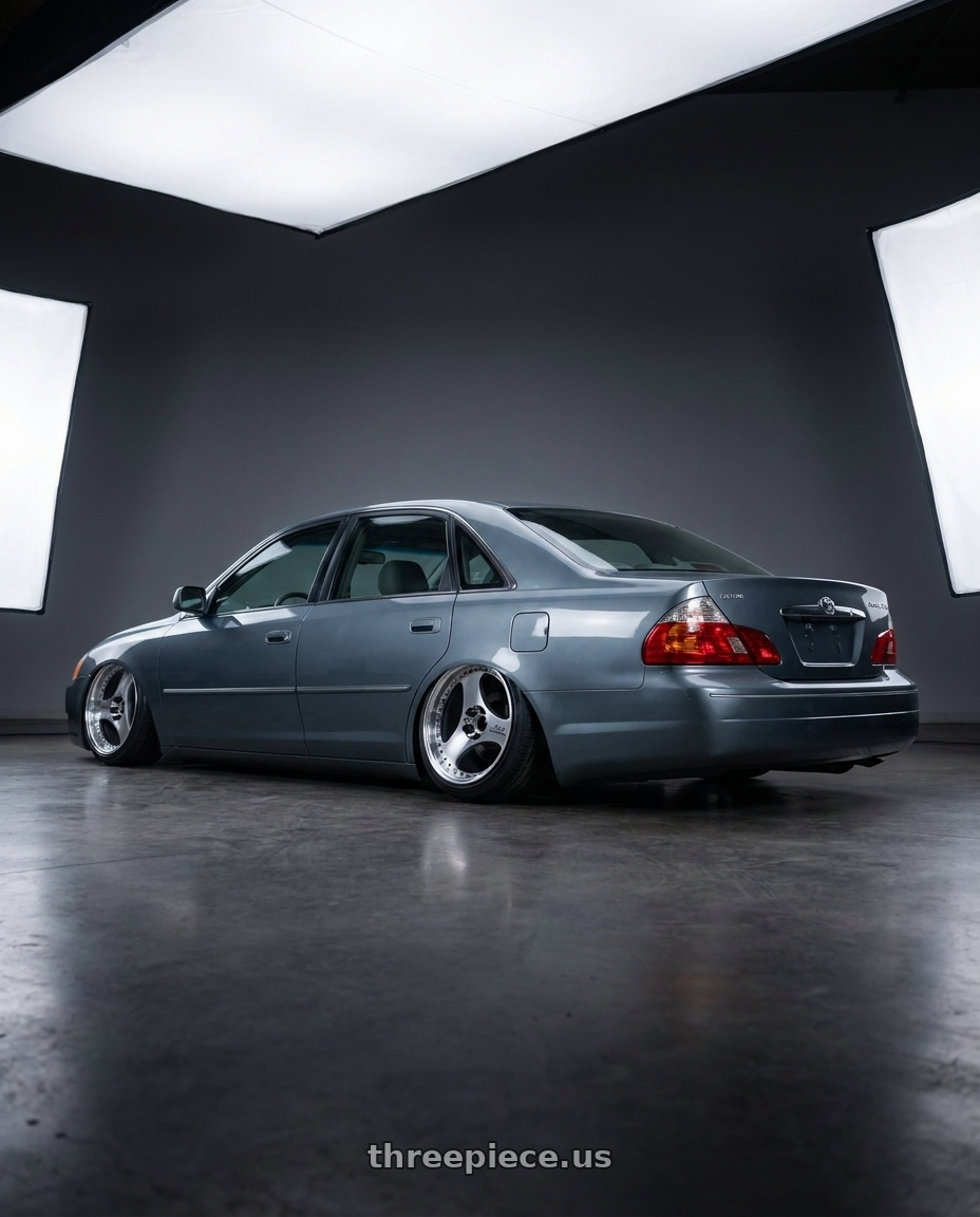 2004 toyota avaloin xls grey blue with Advan Racing ONI2 PROGRESSIVE 5x112 20x9.5 +25 MACHINING & DIAMOND CUT wheels rear three quarter view extreme stretch tires