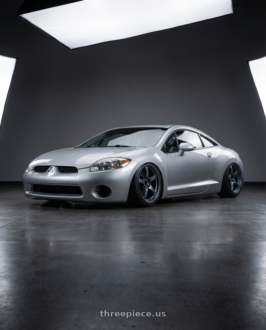 2010 Mitsubishi Eclipse with Gram Lights 57CR 5x114.3 19x10.5+12 Gunblue II wheels front three quarter view stanced stance