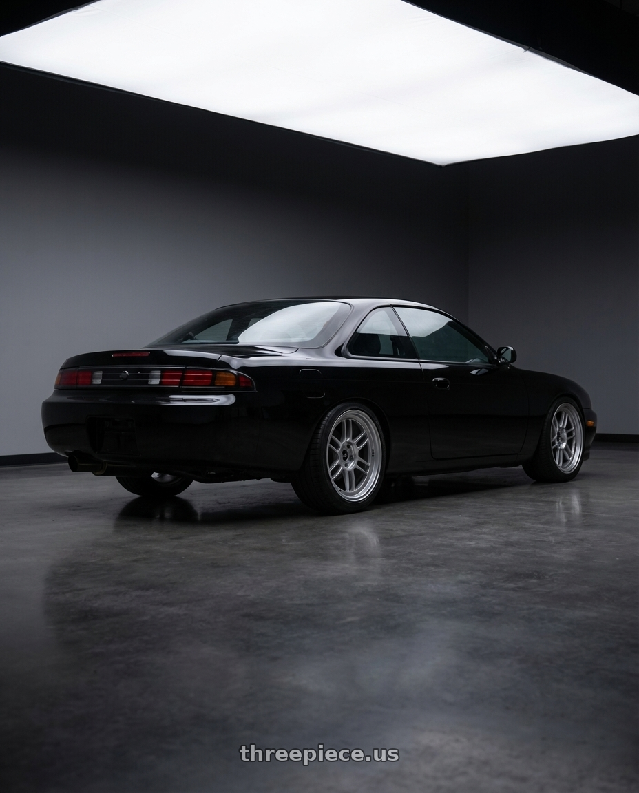 1997 issan 240sx  with Enkei RPF1RS 5x114.3 18x9.5+12 Silver wheels rear three quarter view square tires