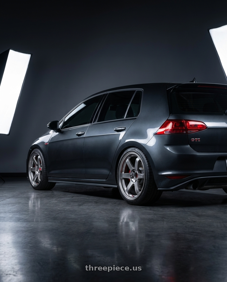 2017 Volkswagen Golf GTI with Volk Racing TE37SL 5x112 19x9.5 +22 FORMULA SILVER wheels rear three quarter view square tires