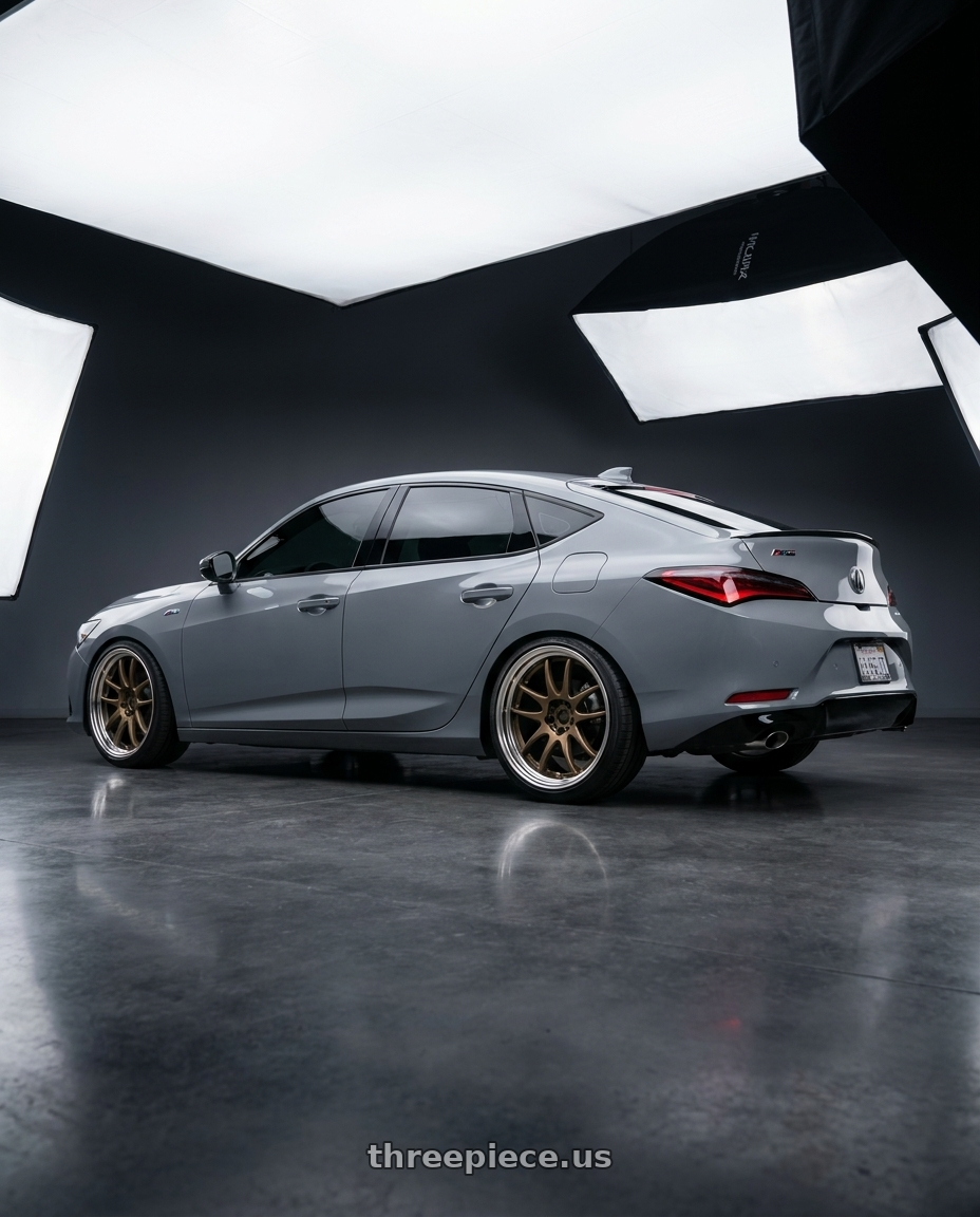 2026 Acura Integra with Work Cr 2P 4x100 17x10.5 +22 Matte Bronze wheels rear three quarter view square tires