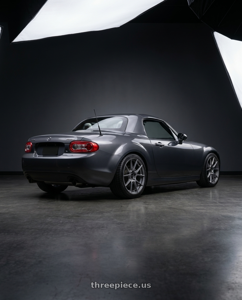 2014 Mazda Miata with Enkei TS-V 5x114.3 17x8+45 Storm Grey wheels rear three quarter view square tires