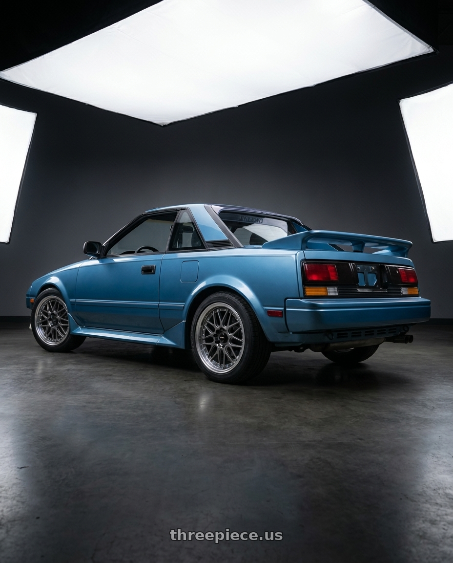 1986 Toyota mr2 with Vors VR7 4x100/4x114.3 15x7  +35 Gun Metal Machine Lip Chrome Rivet wheels rear three quarter view square tires