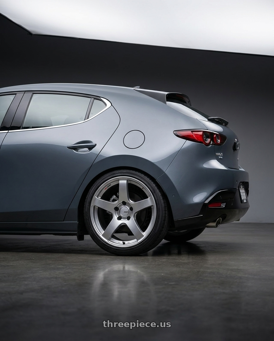 2023 Mazda Mazda3 Turbo with Ssr Gtv01 5x114.3 18x10.5+15  GLARE SILVER wheels rear three quarter view square tires