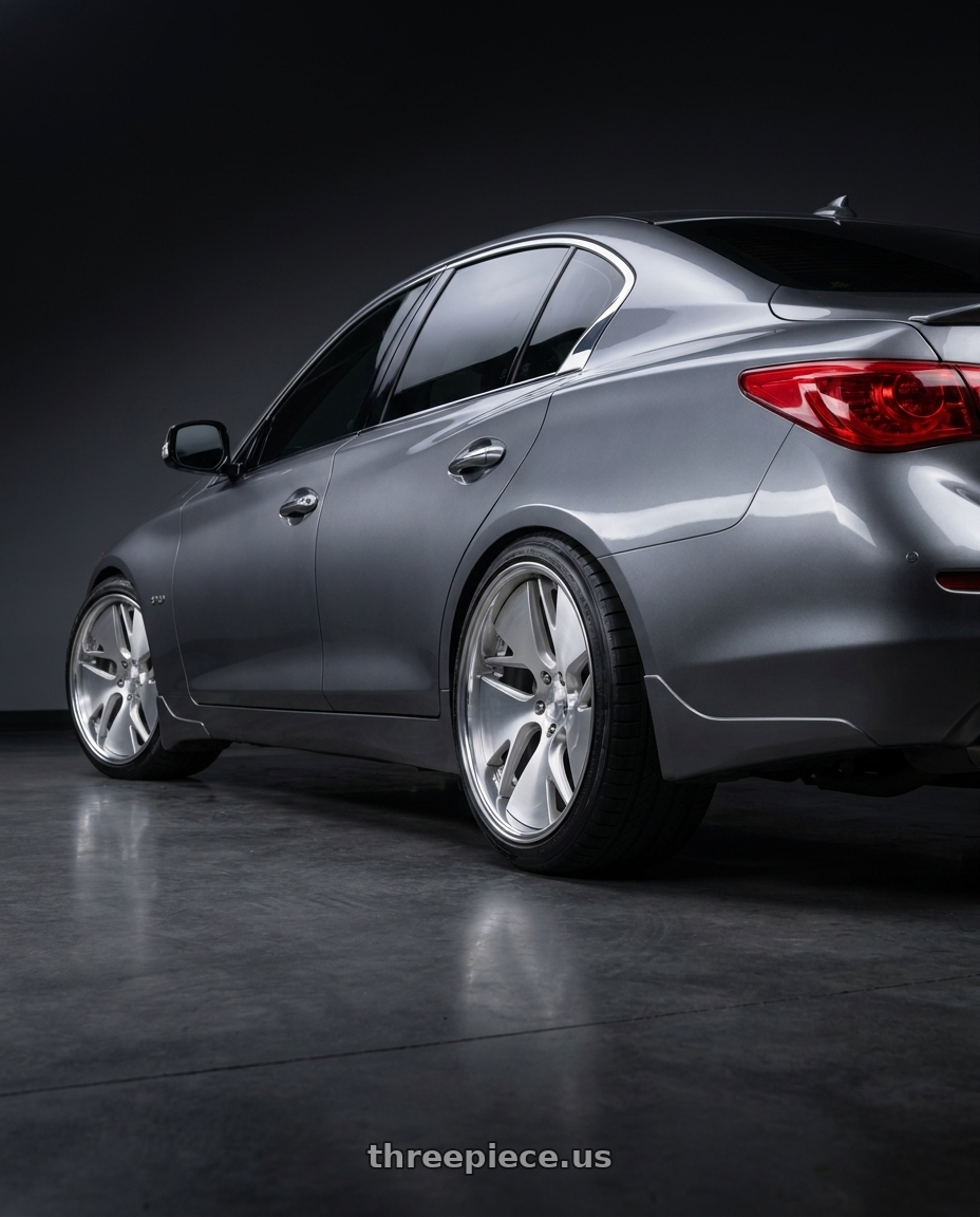 2016 Infiniti Q50 with Work Gnosis Cvd 5x114.3 21x9+45 H Disk Brush Silver Clear wheels rear three quarter view square tires