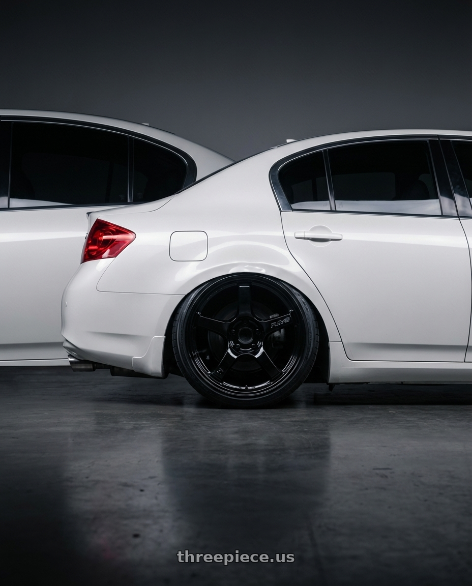 2012 Infiniti G37 with Gram Lights 57CR 5x114.3 19x10.5+35 Glossy Black wheels rear three quarter view slight stretch tires