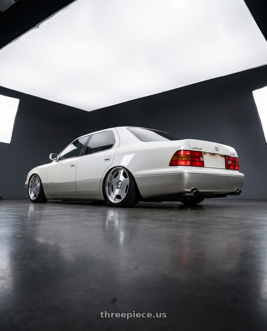 1995 Lexus LS400 base white with Work Lanvec Ld1 5x114.3 18x9.5+0 A Disk Machine Silver Polish wheels rear three quarter view slight stretch tires