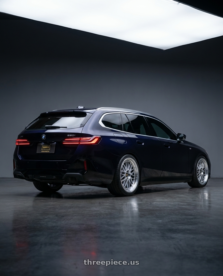 2027 bmw 520i touring m with BBS LM 5x120 21x9.0+32 Diamond Silver wheels rear three quarter view square tires