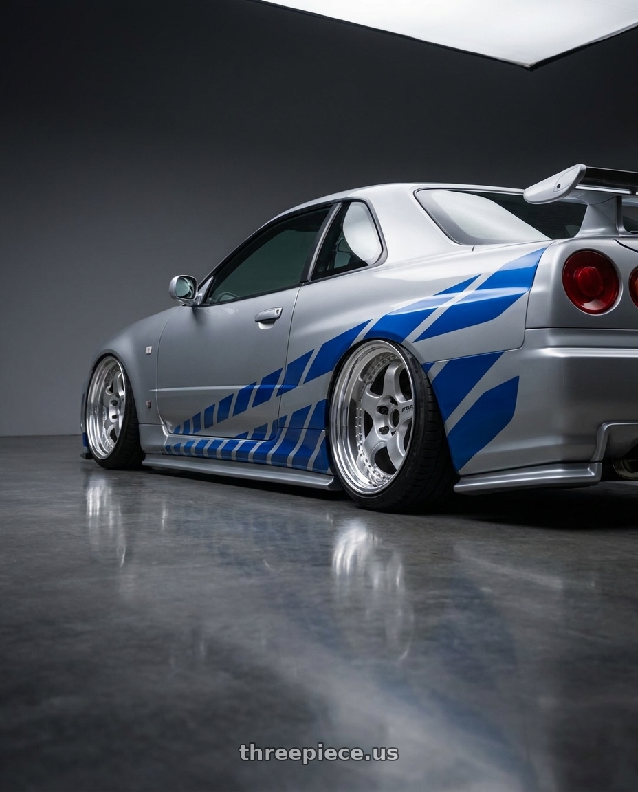 1998 Nissan Skyline GT-R R34 with Work Meister S1 3P 5x114.3 19x10+10 O Disk Silver wheels rear three quarter view slight stretch tires