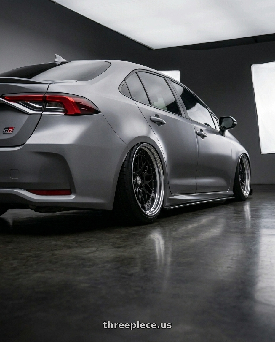2022 Toyota altis GR with Work Gran Seeker Dmx 5x100 20x9.5+-6 O Disk Black wheels rear three quarter view extreme stretch tires