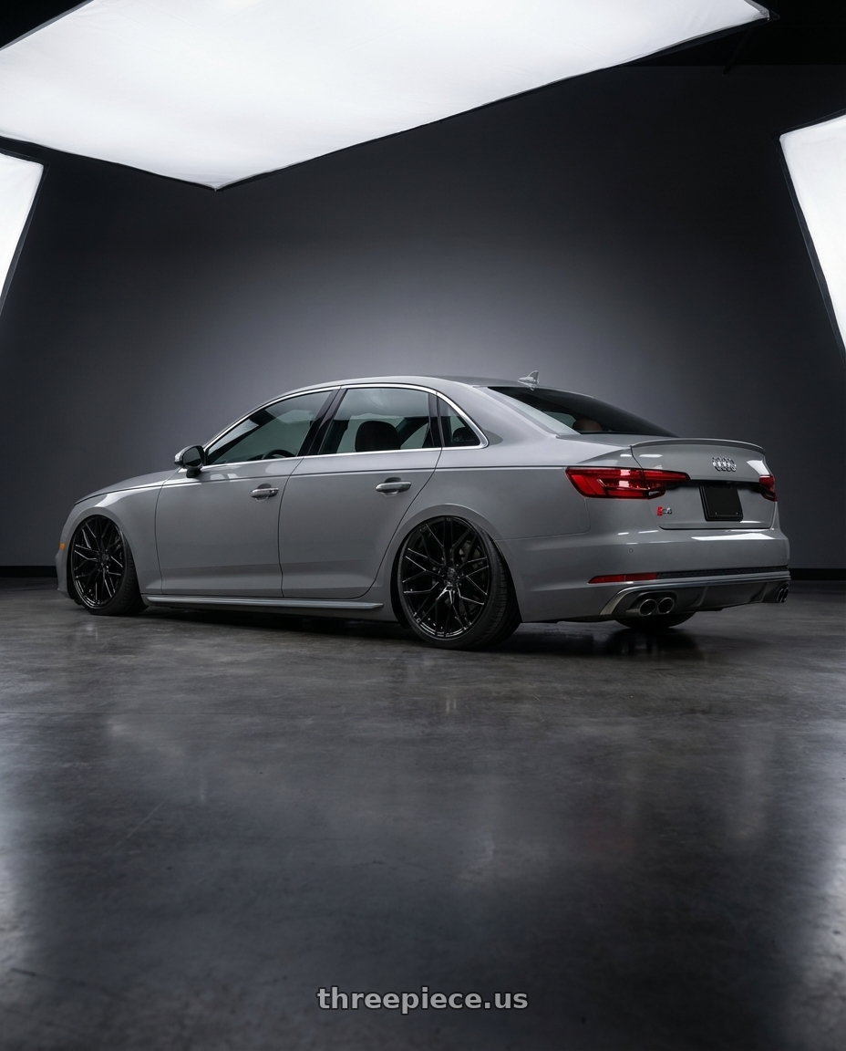 2023 Audi S4 B9 with Avant Garde Wheels M520R 5X112 20x10 +35 Gloss Black wheels rear three quarter view slight stretch tires