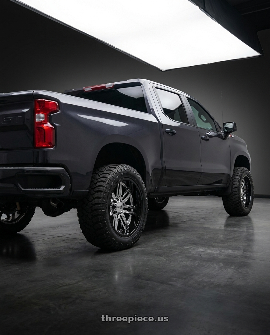 2023 Chevrolet Silverado 1500 with Moto Metal MO202 6X139.7 20X12 -44 CHROME CENTER GLOSS BLACK MILLED LIP wheels rear three quarter view meaty tires