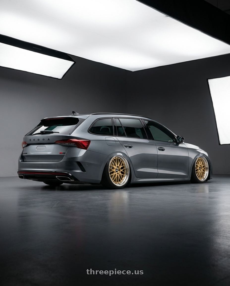 2024 Koda octavia combi rs with BBS LM 5x114.3 18x9.0+42 Gold wheels rear three quarter view slight stretch tires