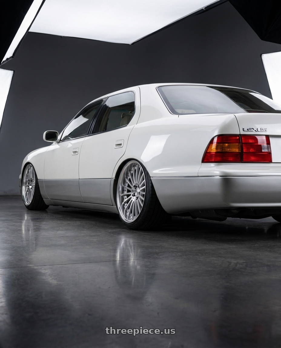 1995 Lexus LS400 with Work Lanvec Lf1 5x114.3 18x8+38 O Disk Machine Silver Polish wheels rear three quarter view slight stretch tires