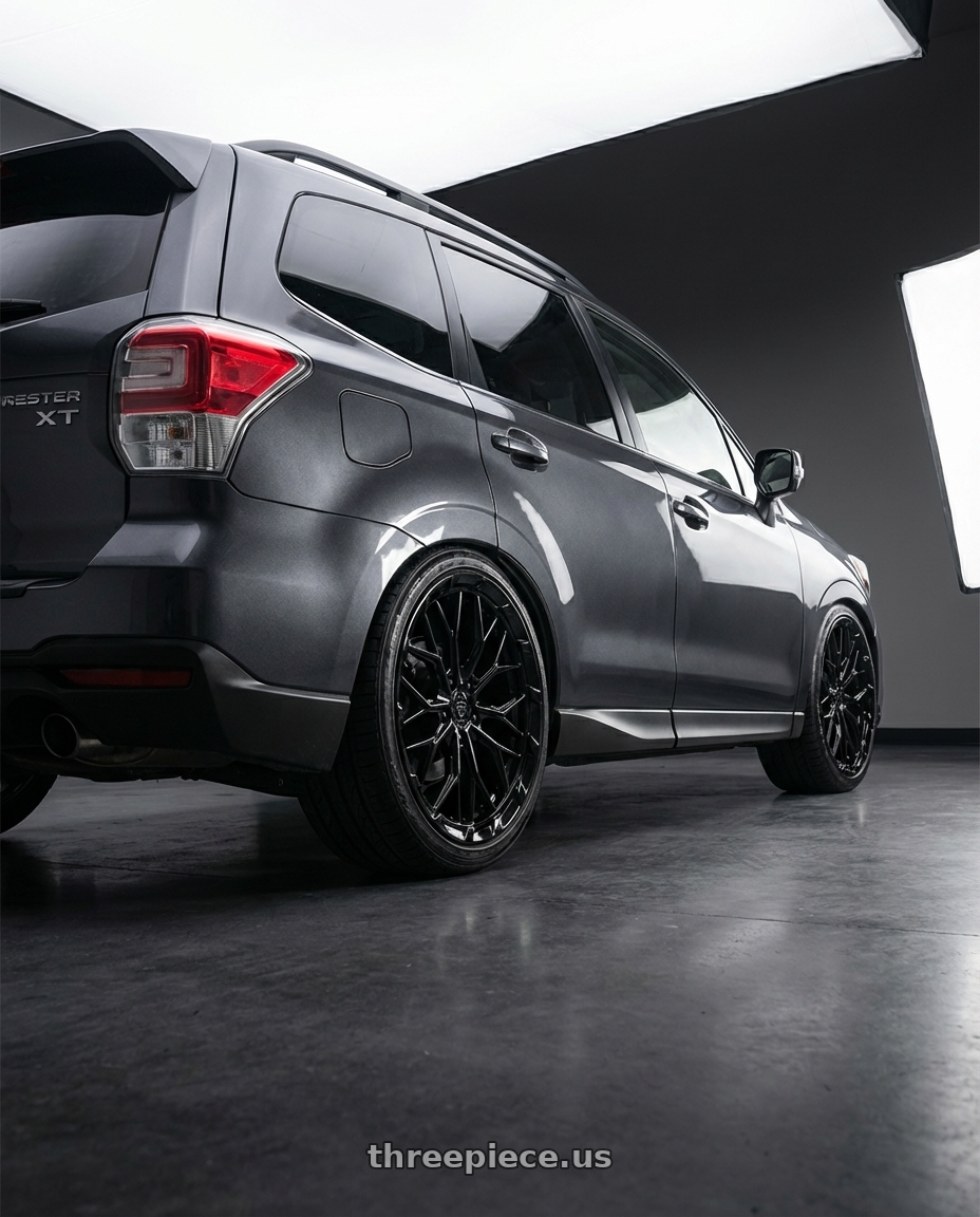 2017 Subaru Forester XT Dark Metallic Grey with DOLCE PERFORMANCE MAGARI 5x120 20x9 +35 Gloss Black wheels rear three quarter view slight stretch tires