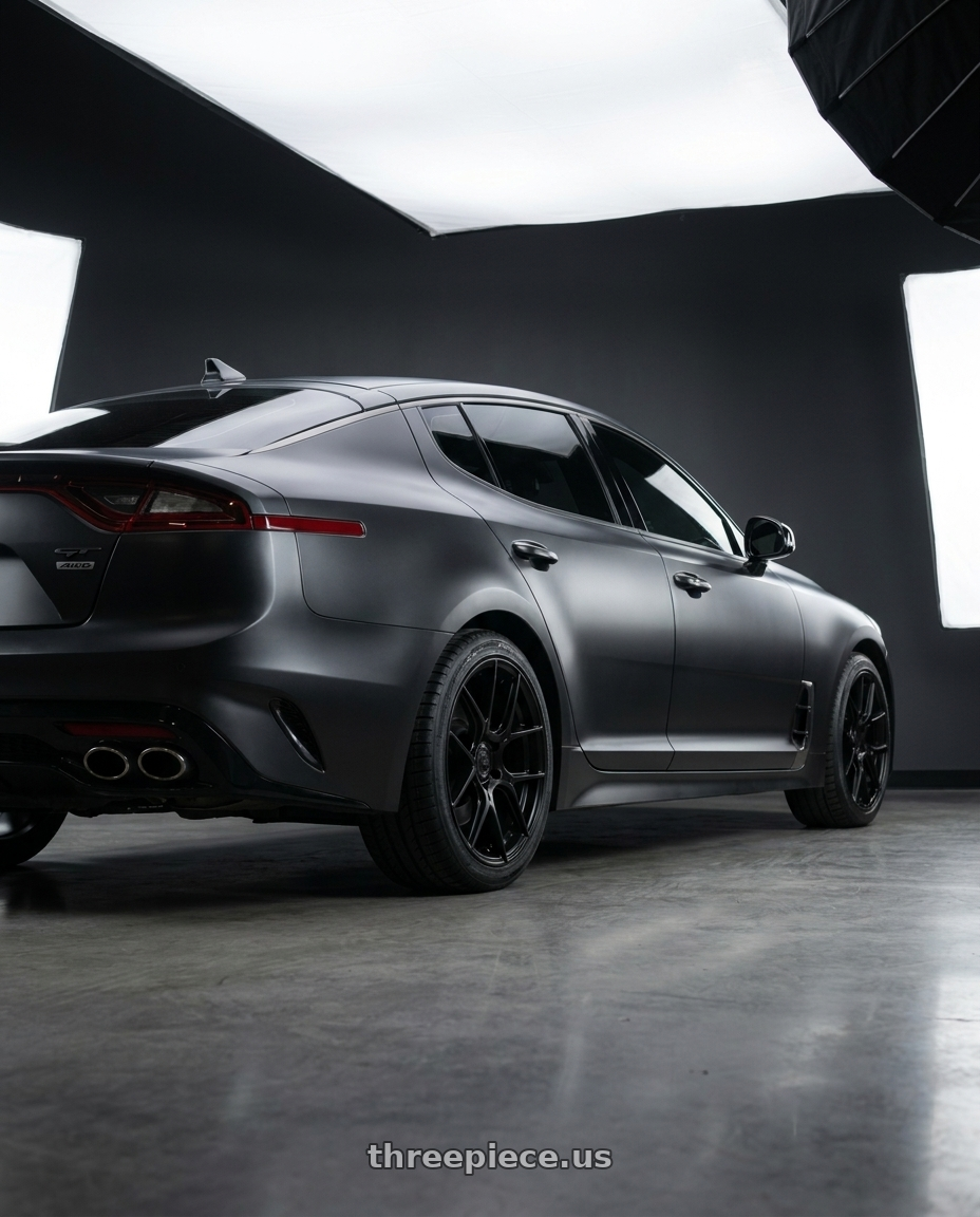 Kia stinger gt1 2018 with Aodhan AH-X 5x114.3 18x8.5+35 Matte Black wheels rear three quarter view square tires