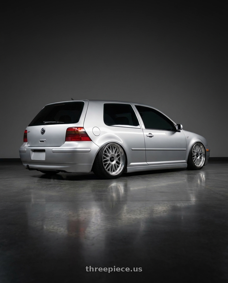 2002 VW GTI  with Rotiform 1PC R170 DTM 5X100/5X112 18X8.5 +35 SILVER wheels rear three quarter view slight stretch tires