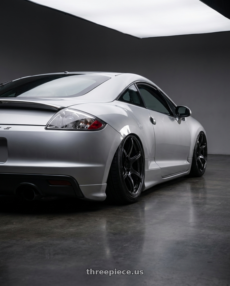 2010 Mitsubishi Eclipse with Advan RGIII 5x114.3 18x8.0+37 Gloss Black wheels rear three quarter view slight stretch tires
