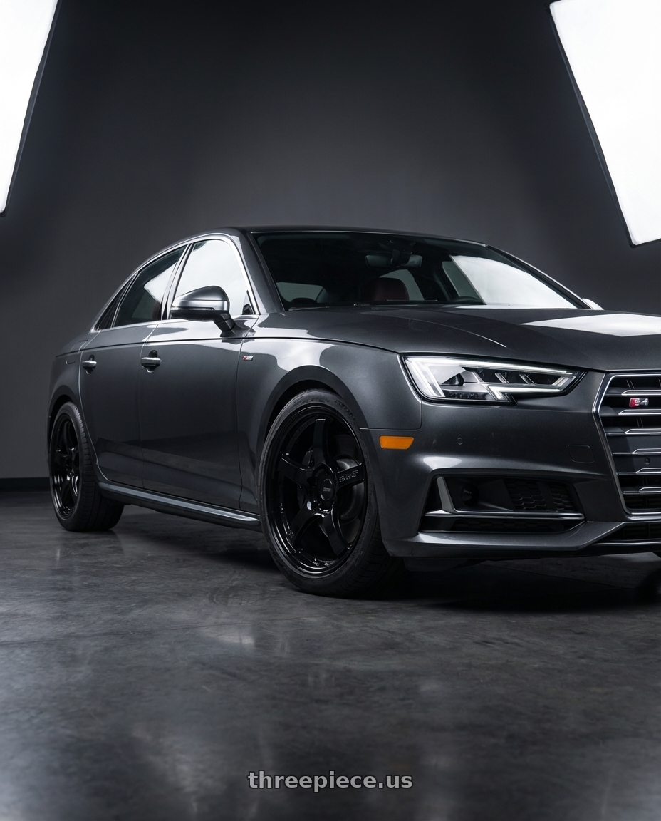 2023 Audi S4 B9 with Gram Lights 57CR 5x112 19x9.5+25 Glossy Black wheels front three quarter view lowered stance