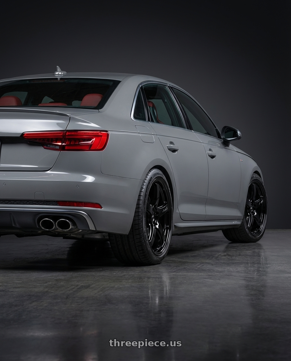 2023 Audi S4 B9 with Gram Lights 57CR 5x112 19x9.5+25 Glossy Black wheels rear three quarter view square tires