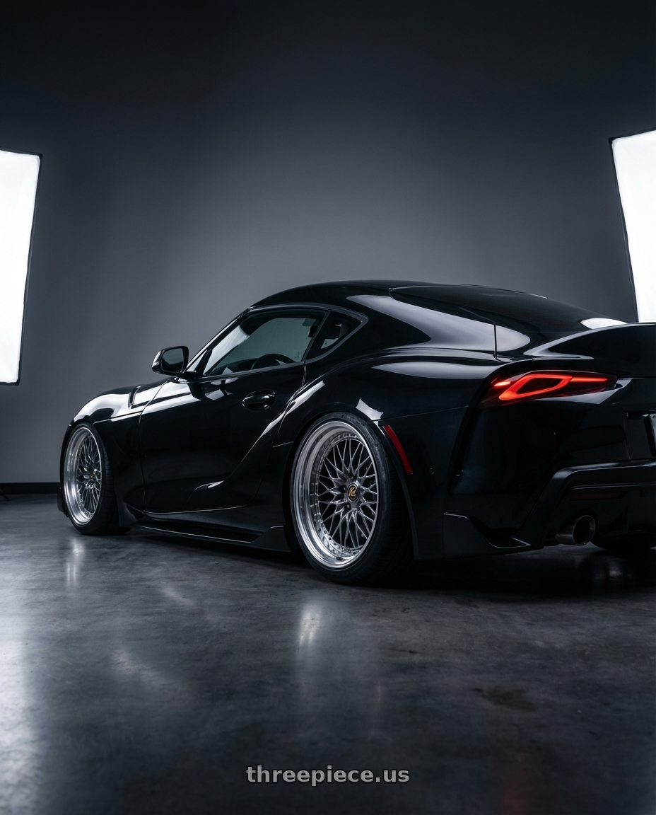 2020 Toyota Supra  with Work Vs-Xv 5x100 18x8.5+27 O Disk Brilliant Silver Black wheels rear three quarter view slight stretch tires
