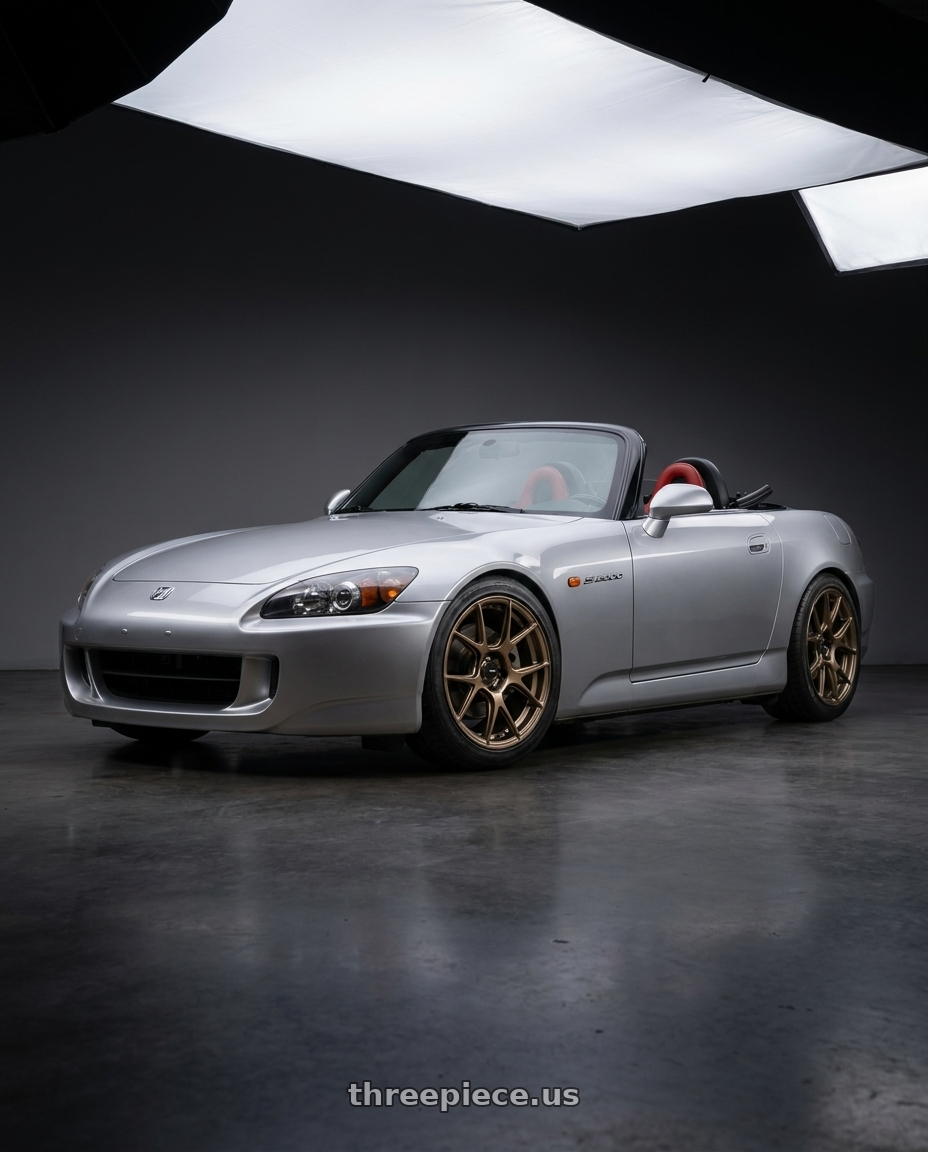 2009 Honda S2000 with Konig Ampliform 5x114.3 17x9+40 Gloss Bronze wheels