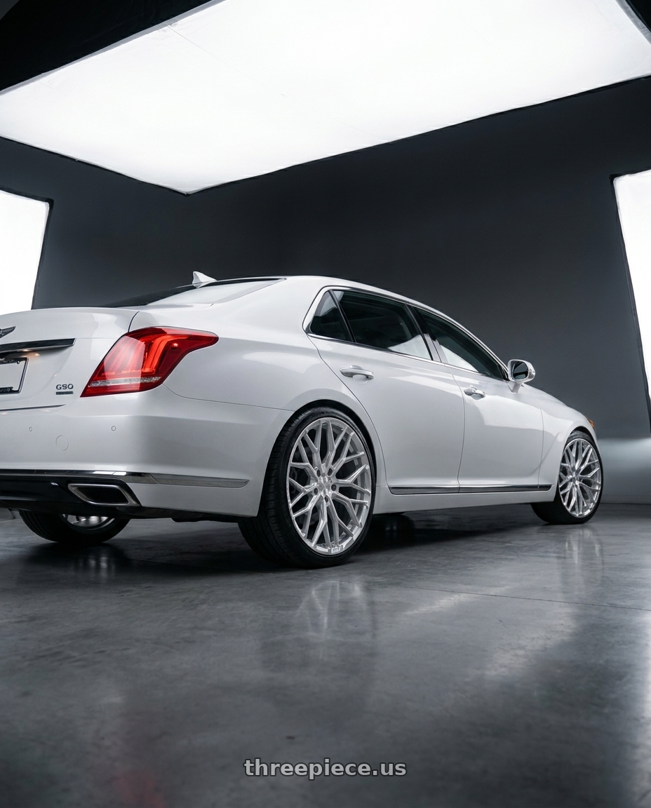 2018 genesis g90 ultimate with DOLCE PERFORMANCE MAGARI 5x114.3 20x8.5 +38 Gloss Silver wheels rear three quarter view square tires