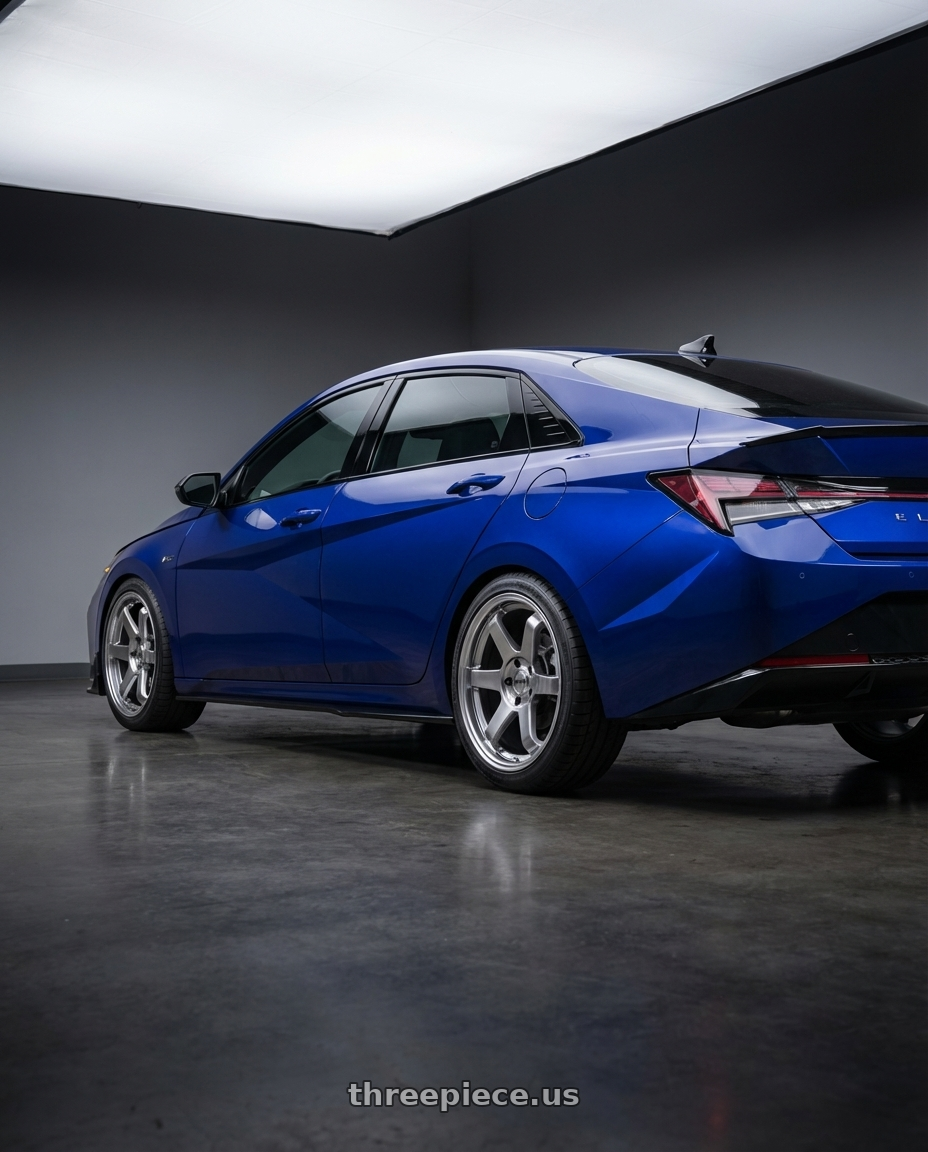 2025 Hyundai Elantra N-Line  with F1R F106 5x100 18x8.5 +35 Hyper Black wheels rear three quarter view square tires