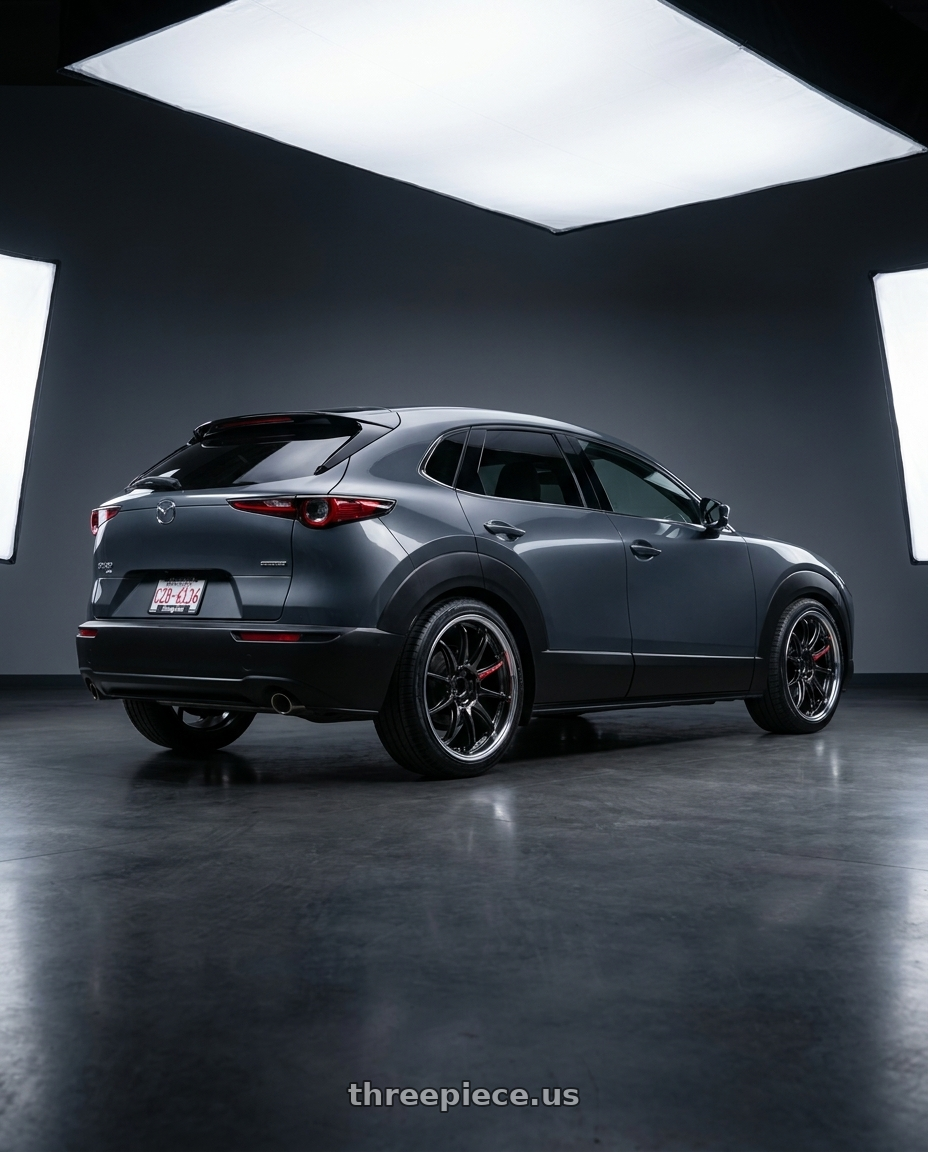 2026 mazda cx30 with Work Zr10 2P 5x114.3 18x10.0 +0 Glim Black wheels rear three quarter view slight stretch tires