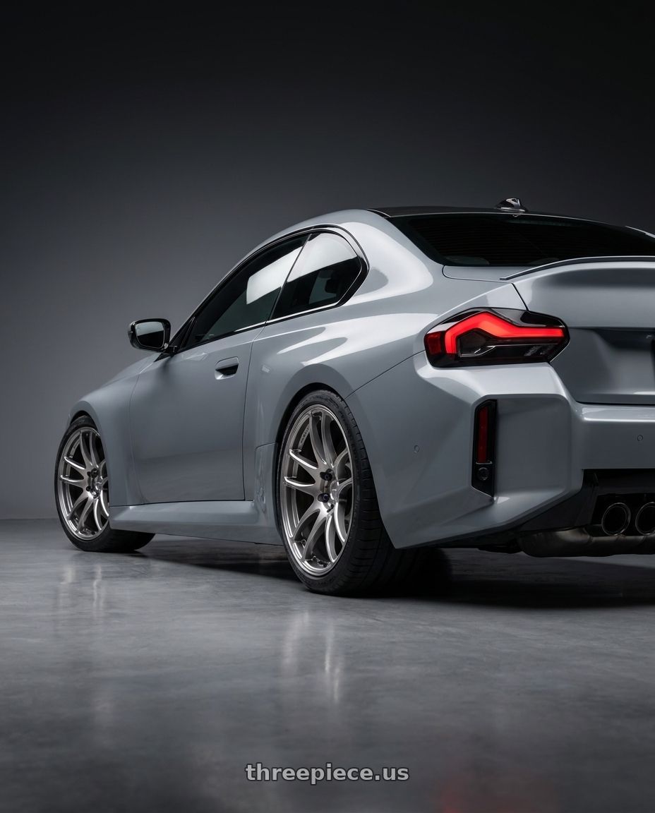 2025 BMW M2 with Work Emotion Cr Kiwami 5x112 19x9.5 +15 Gt Silver wheels rear three quarter view square tires