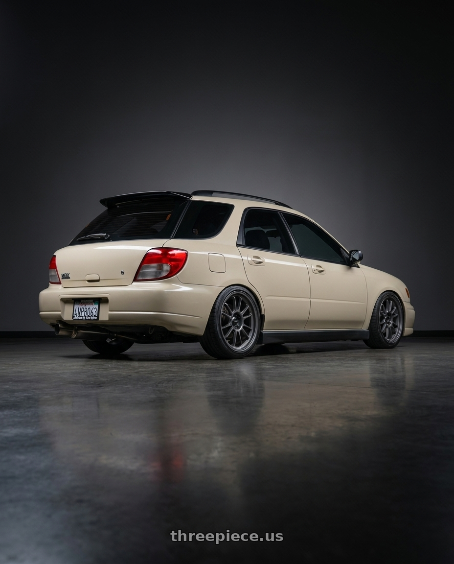 2002 Subaru wrx wagon with Konig Hypergram 5x100 17x8+40 Matte Grey wheels rear three quarter view slight stretch tires