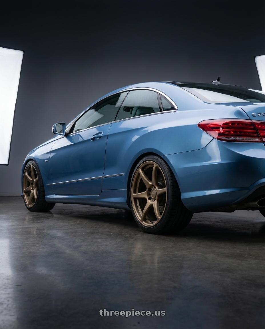 2014 Mercedes-Benz E-Class Coupe C207 with Kansei K11B Tandem 5X112 19x9.5 22 Bronze wheels rear three quarter view square tires